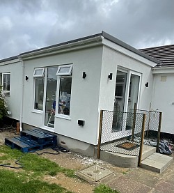 Full extension including new kitchen.patio and steps to be finished in the spring.